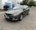 Серый Мазда 6, объемом двигателя 2 л и пробегом 312 тыс. км за 6500 $, фото 1 на Automoto.ua