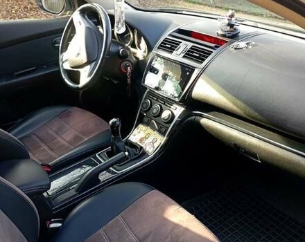 Сірий Мазда 6, об'ємом двигуна 2 л та пробігом 246 тис. км за 7600 $, фото 4 на Automoto.ua