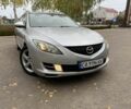 Серый Мазда 6, объемом двигателя 2 л и пробегом 274 тыс. км за 6499 $, фото 1 на Automoto.ua