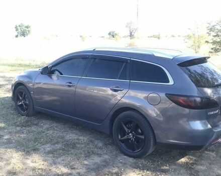 Серый Мазда 6, объемом двигателя 2 л и пробегом 301 тыс. км за 6600 $, фото 1 на Automoto.ua