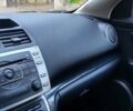 Серый Мазда 6, объемом двигателя 2 л и пробегом 246 тыс. км за 6700 $, фото 1 на Automoto.ua