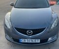 Серый Мазда 6, объемом двигателя 2 л и пробегом 385 тыс. км за 5500 $, фото 1 на Automoto.ua