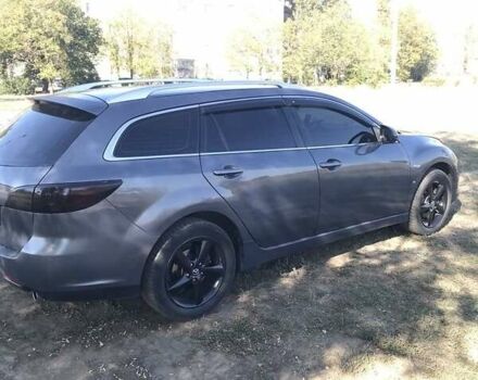Серый Мазда 6, объемом двигателя 2 л и пробегом 301 тыс. км за 6600 $, фото 2 на Automoto.ua