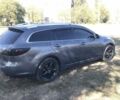 Серый Мазда 6, объемом двигателя 2 л и пробегом 301 тыс. км за 6600 $, фото 2 на Automoto.ua