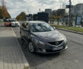 Серый Мазда 6, объемом двигателя 2 л и пробегом 324 тыс. км за 6500 $, фото 1 на Automoto.ua