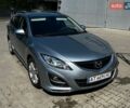 Серый Мазда 6, объемом двигателя 2.2 л и пробегом 241 тыс. км за 6850 $, фото 1 на Automoto.ua