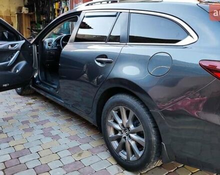 Серый Мазда 6, объемом двигателя 2.19 л и пробегом 226 тыс. км за 10500 $, фото 31 на Automoto.ua