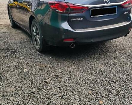 Серый Мазда 6, объемом двигателя 2.19 л и пробегом 226 тыс. км за 10500 $, фото 9 на Automoto.ua