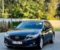 Серый Мазда 6, объемом двигателя 2 л и пробегом 196 тыс. км за 11800 $, фото 1 на Automoto.ua