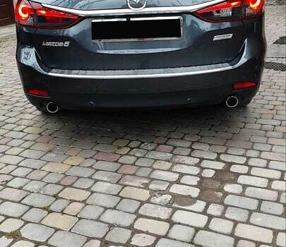 Серый Мазда 6, объемом двигателя 2.19 л и пробегом 226 тыс. км за 10500 $, фото 43 на Automoto.ua