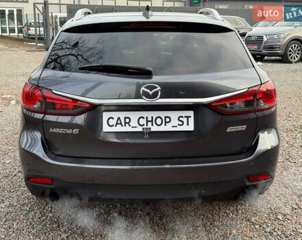 Серый Мазда 6, объемом двигателя 2.19 л и пробегом 226 тыс. км за 10900 $, фото 13 на Automoto.ua
