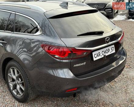 Серый Мазда 6, объемом двигателя 2.19 л и пробегом 226 тыс. км за 10900 $, фото 10 на Automoto.ua