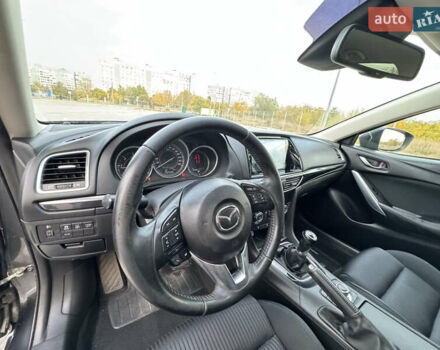 Серый Мазда 6, объемом двигателя 2.18 л и пробегом 293 тыс. км за 10990 $, фото 16 на Automoto.ua