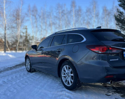 Серый Мазда 6, объемом двигателя 2.18 л и пробегом 292 тыс. км за 9999 $, фото 1 на Automoto.ua