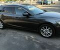Серый Мазда 6, объемом двигателя 2.19 л и пробегом 203 тыс. км за 11600 $, фото 3 на Automoto.ua