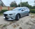 Серый Мазда 6, объемом двигателя 2.2 л и пробегом 195 тыс. км за 13000 $, фото 1 на Automoto.ua