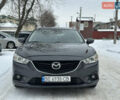 Сірий Мазда 6, об'ємом двигуна 2.19 л та пробігом 260 тис. км за 12700 $, фото 3 на Automoto.ua