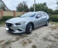 Серый Мазда 6, объемом двигателя 2.2 л и пробегом 195 тыс. км за 12500 $, фото 1 на Automoto.ua