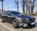 Серый Мазда 6, объемом двигателя 2.19 л и пробегом 217 тыс. км за 15500 $, фото 7 на Automoto.ua