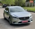 Серый Мазда 6, объемом двигателя 2.19 л и пробегом 165 тыс. км за 15500 $, фото 2 на Automoto.ua