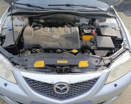Серый Мазда 6, объемом двигателя 2 л и пробегом 246 тыс. км за 4200 $, фото 2 на Automoto.ua