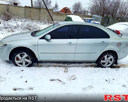 Серый Мазда 6, объемом двигателя 2 л и пробегом 245 тыс. км за 3200 $, фото 5 на Automoto.ua
