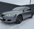 Сірий Мазда 6, об'ємом двигуна 2 л та пробігом 317 тис. км за 5555 $, фото 1 на Automoto.ua