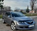 Серый Мазда 6, объемом двигателя 2 л и пробегом 325 тыс. км за 3900 $, фото 1 на Automoto.ua