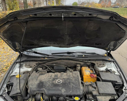 Серый Мазда 6, объемом двигателя 2 л и пробегом 243 тыс. км за 4200 $, фото 12 на Automoto.ua