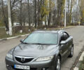 Серый Мазда 6, объемом двигателя 2 л и пробегом 243 тыс. км за 4200 $, фото 1 на Automoto.ua