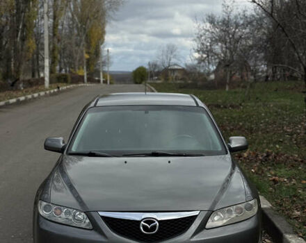 Серый Мазда 6, объемом двигателя 2 л и пробегом 243 тыс. км за 4200 $, фото 1 на Automoto.ua