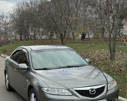 Серый Мазда 6, объемом двигателя 2 л и пробегом 243 тыс. км за 4200 $, фото 2 на Automoto.ua