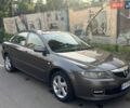 Серый Мазда 6, объемом двигателя 2 л и пробегом 244 тыс. км за 4350 $, фото 1 на Automoto.ua