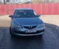 Сірий Мазда 6, об'ємом двигуна 2 л та пробігом 302 тис. км за 2999 $, фото 1 на Automoto.ua