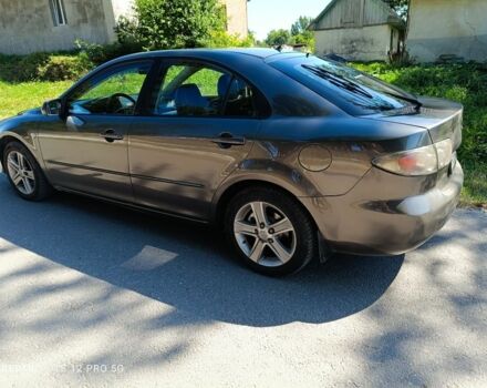 Серый Мазда 6, объемом двигателя 2 л и пробегом 250 тыс. км за 3600 $, фото 2 на Automoto.ua