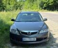 Серый Мазда 6, объемом двигателя 2 л и пробегом 253 тыс. км за 4100 $, фото 1 на Automoto.ua