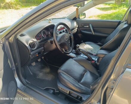 Серый Мазда 6, объемом двигателя 2 л и пробегом 250 тыс. км за 3600 $, фото 4 на Automoto.ua