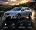 Серый Мазда 6, объемом двигателя 2 л и пробегом 246 тыс. км за 5700 $, фото 1 на Automoto.ua