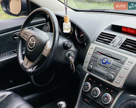 Сірий Мазда 6, об'ємом двигуна 2 л та пробігом 247 тис. км за 5700 $, фото 4 на Automoto.ua