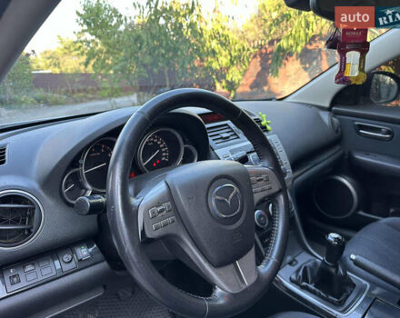 Серый Мазда 6, объемом двигателя 2 л и пробегом 246 тыс. км за 7100 $, фото 5 на Automoto.ua