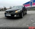 Серый Мазда 6, объемом двигателя 2 л и пробегом 305 тыс. км за 6300 $, фото 1 на Automoto.ua