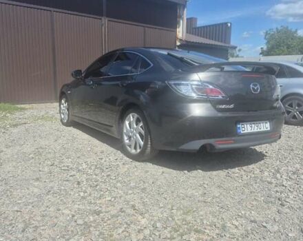 Серый Мазда 6, объемом двигателя 2.18 л и пробегом 245 тыс. км за 8300 $, фото 1 на Automoto.ua