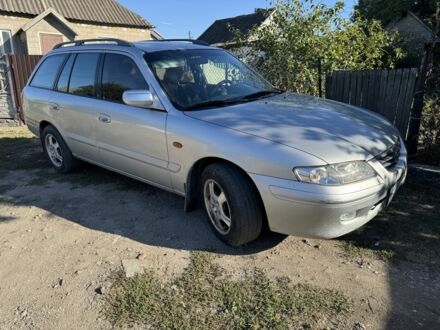 Серый Мазда 6, объемом двигателя 2 л и пробегом 330 тыс. км за 2300 $, фото 1 на Automoto.ua
