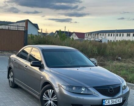 Сірий Мазда 6, об'ємом двигуна 2 л та пробігом 295 тис. км за 3599 $, фото 1 на Automoto.ua