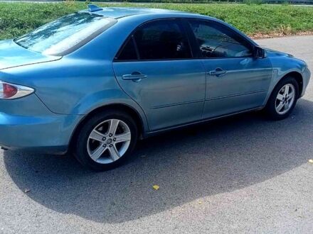 Серый Мазда 6, объемом двигателя 2.3 л и пробегом 300 тыс. км за 3500 $, фото 1 на Automoto.ua