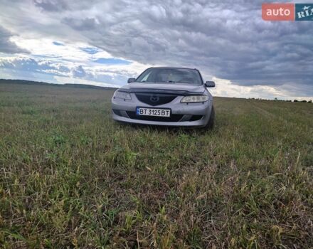 Серый Мазда 6, объемом двигателя 2 л и пробегом 276 тыс. км за 2600 $, фото 1 на Automoto.ua