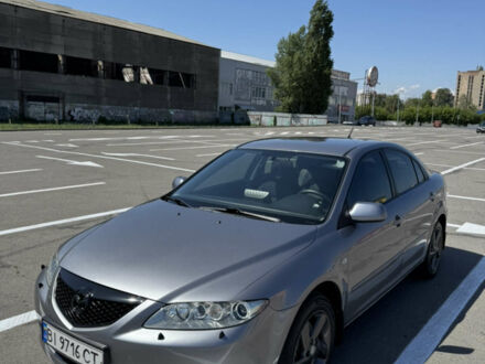 Серый Мазда 6, объемом двигателя 2 л и пробегом 320 тыс. км за 5100 $, фото 1 на Automoto.ua