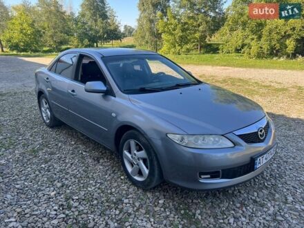 Серый Мазда 6, объемом двигателя 1.8 л и пробегом 300 тыс. км за 3000 $, фото 1 на Automoto.ua