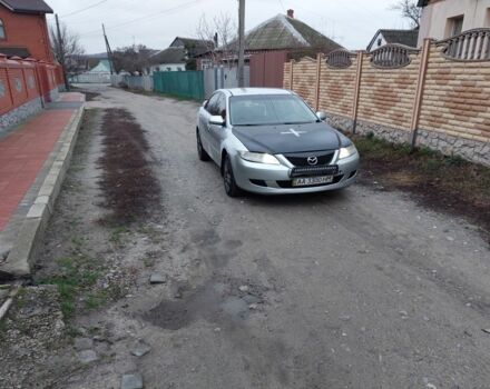 Серый Мазда 6, объемом двигателя 2 л и пробегом 380 тыс. км за 1467 $, фото 1 на Automoto.ua