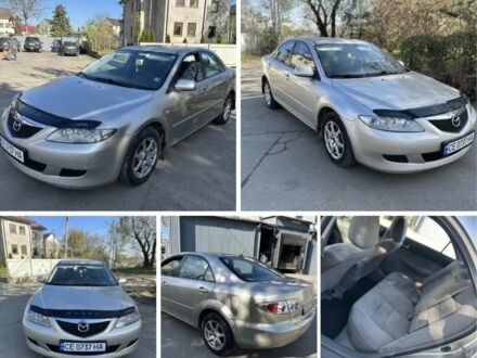 Серый Мазда 6, объемом двигателя 2 л и пробегом 250 тыс. км за 2900 $, фото 1 на Automoto.ua